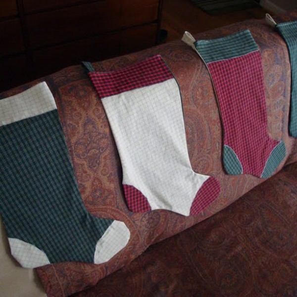 Turn thrifted shirts into adorable DIY Christmas stockings for the whole family!