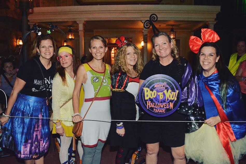 MNSSHP with friends in Disney Halloween costumes Parade