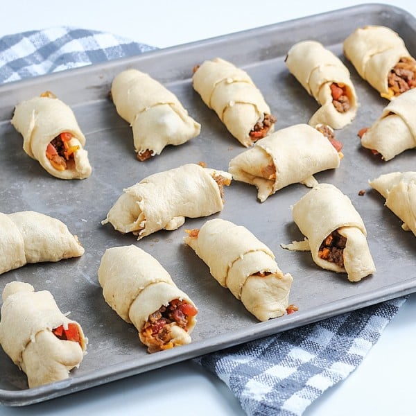 Empanadas on baking sheet