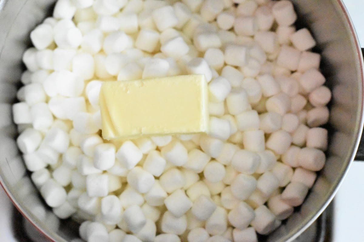 melt marshmallows and butter in saucepan