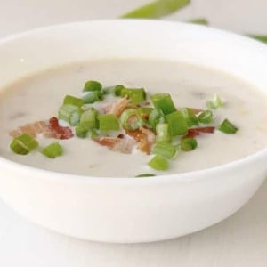 Corn Chowder featured in bowl with toppings