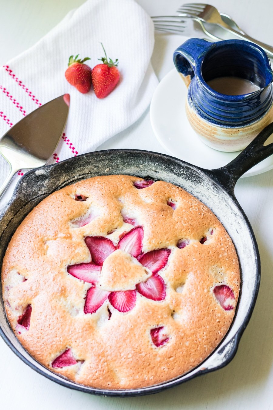 cooked strawberry cake in a cast iron pan