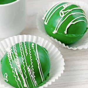 Green Hot Cocoa Bombs in paper liners