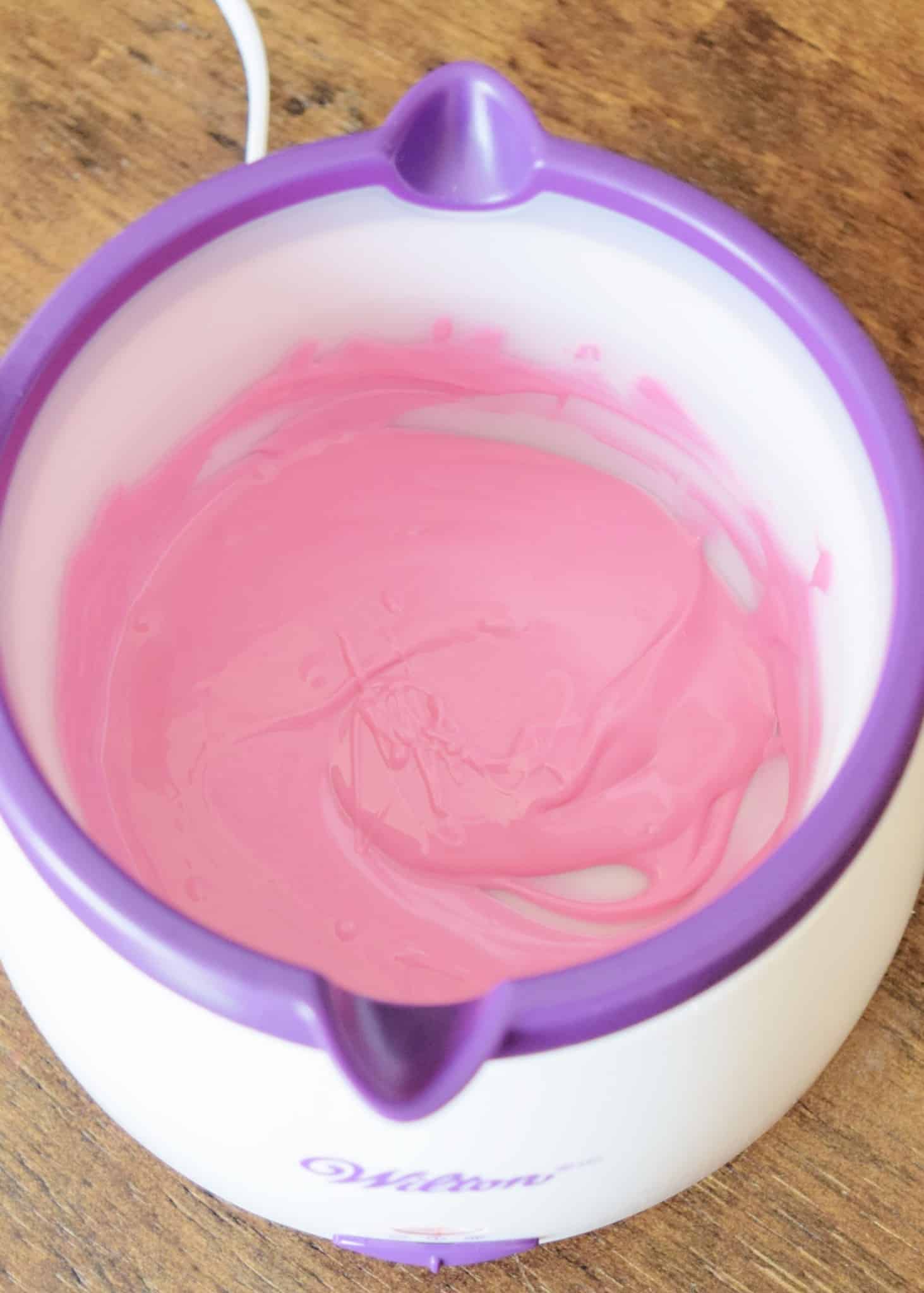 pink candy melts in a warm melter
