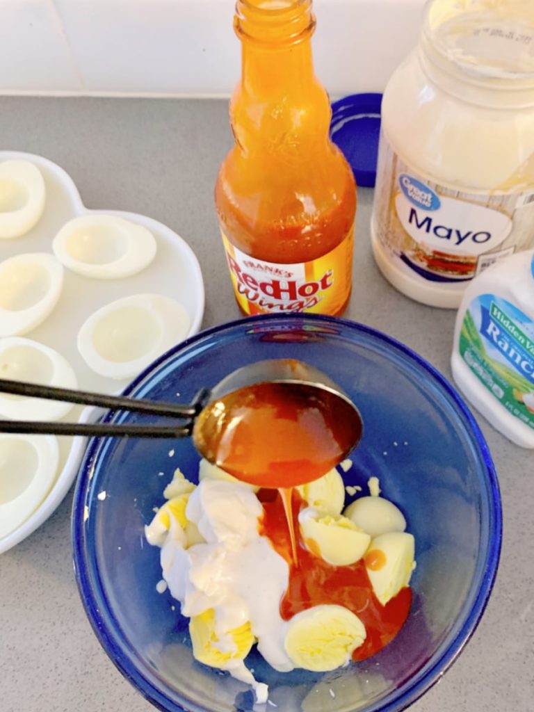 mix in buffalo sauce with yolks