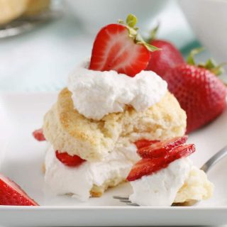 strawberry shortcake with bite on fork