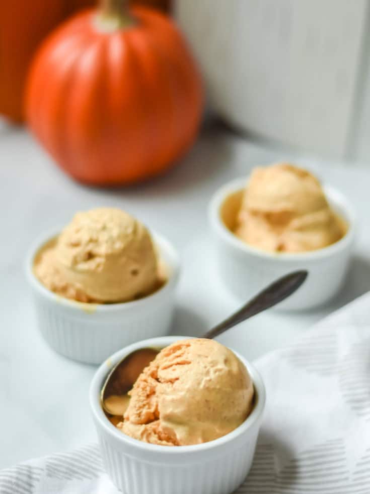 Pumpkin Ice Cream in three small white bowls