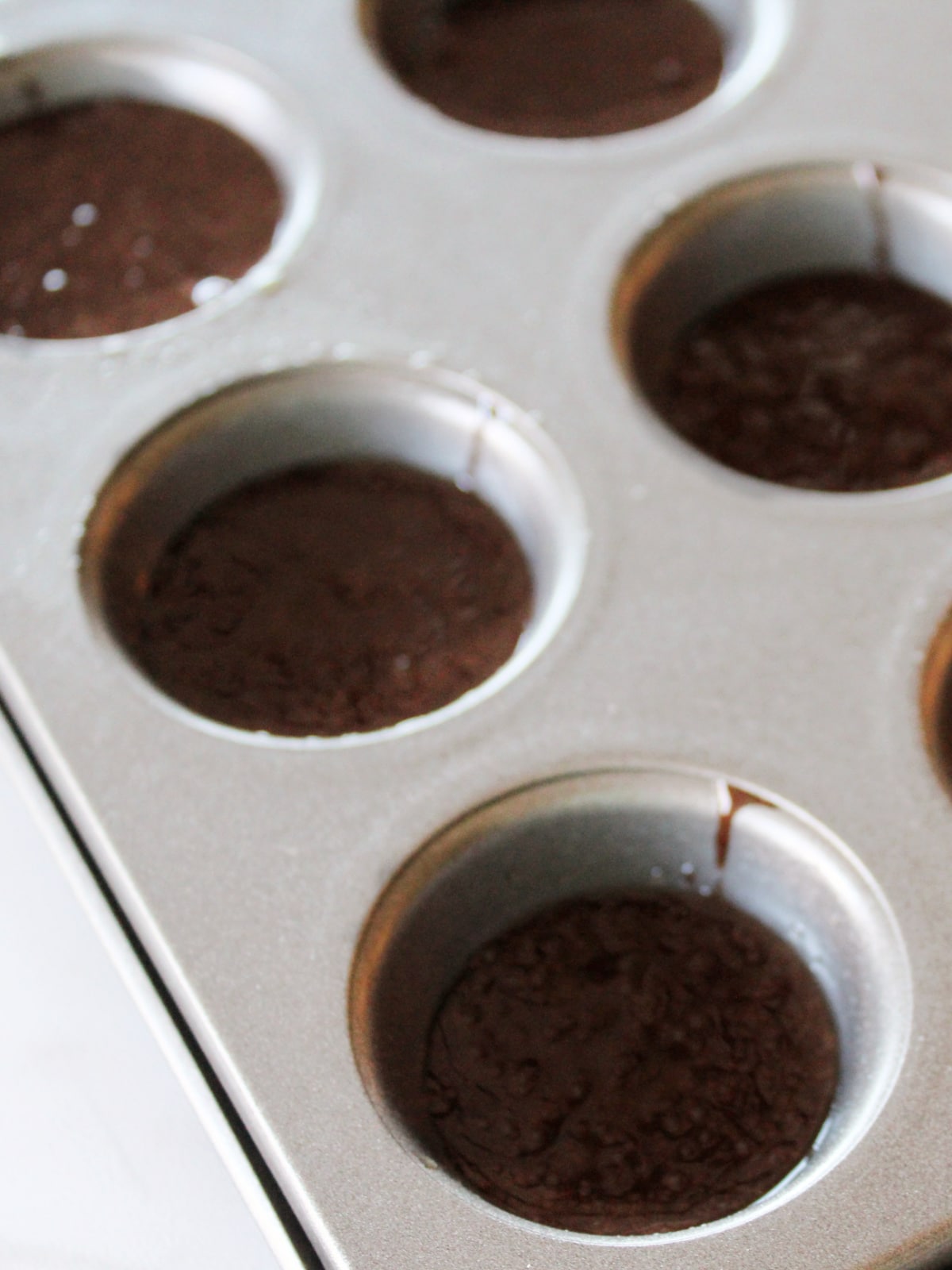 Brownie mix in mini muffin pan