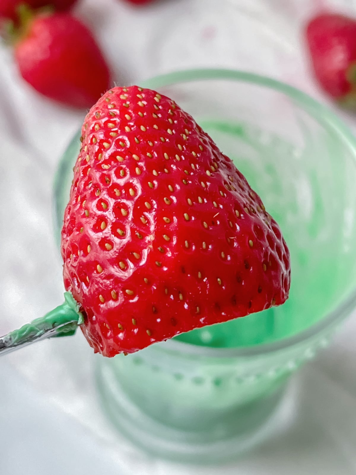 dip strawberries in green