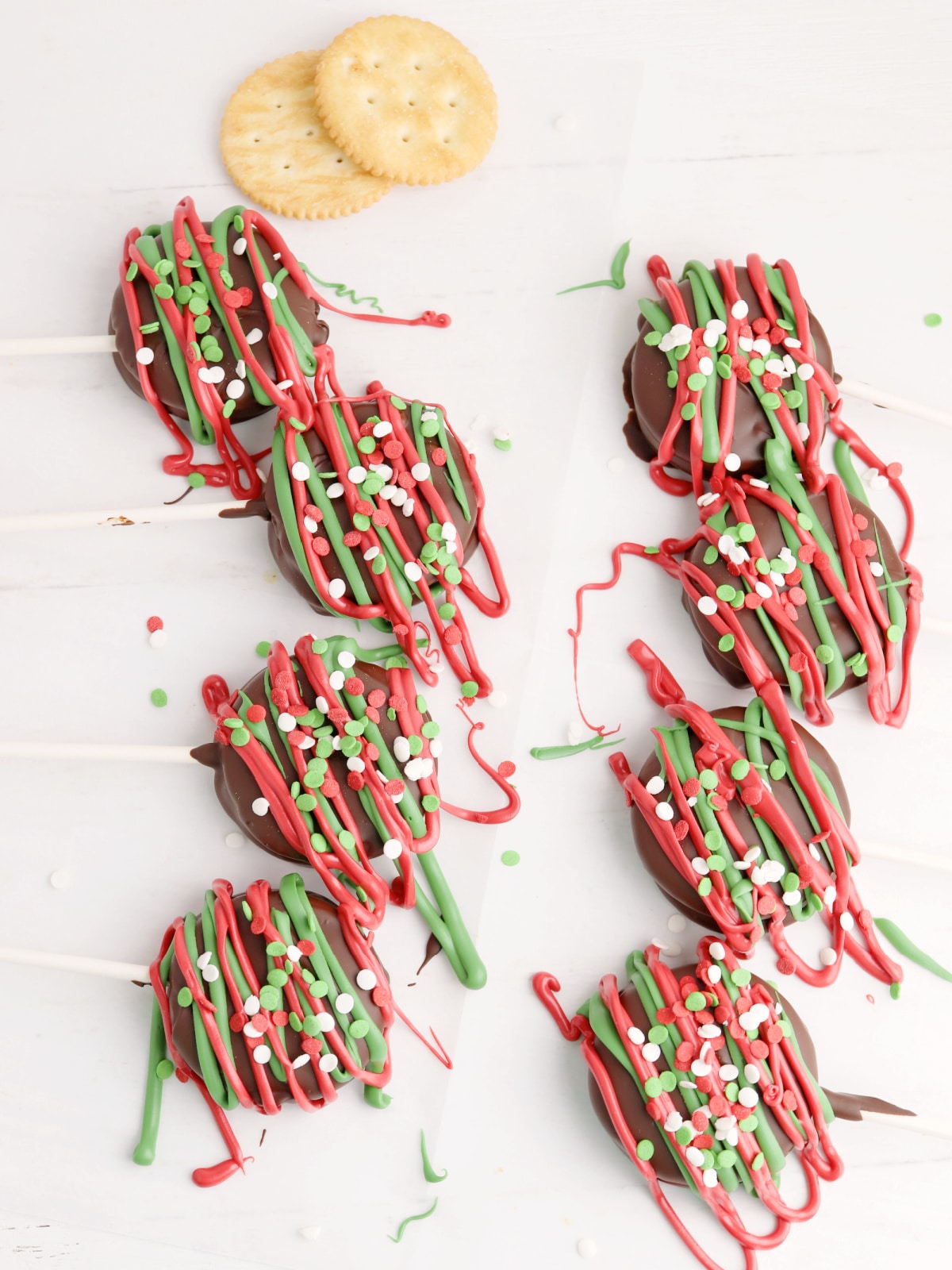 drizzle with red and green melted chocolate and sprinkles