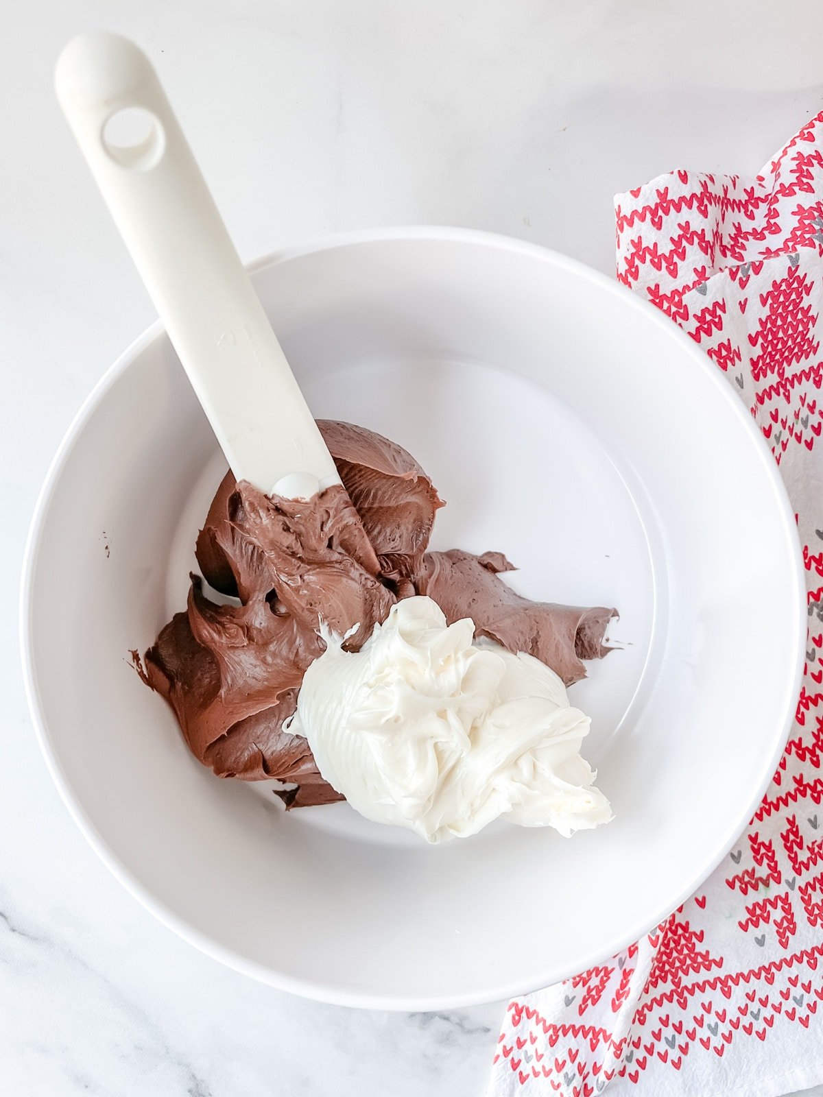 mix together chocolate and vanilla frosting