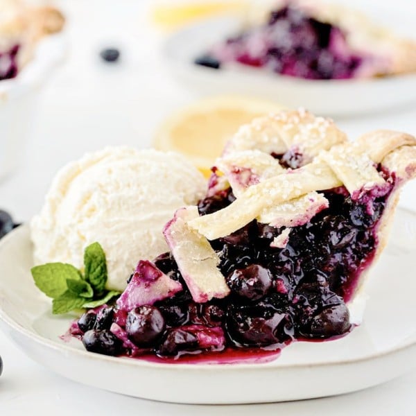 Blueberry Pie on plate with ice cream