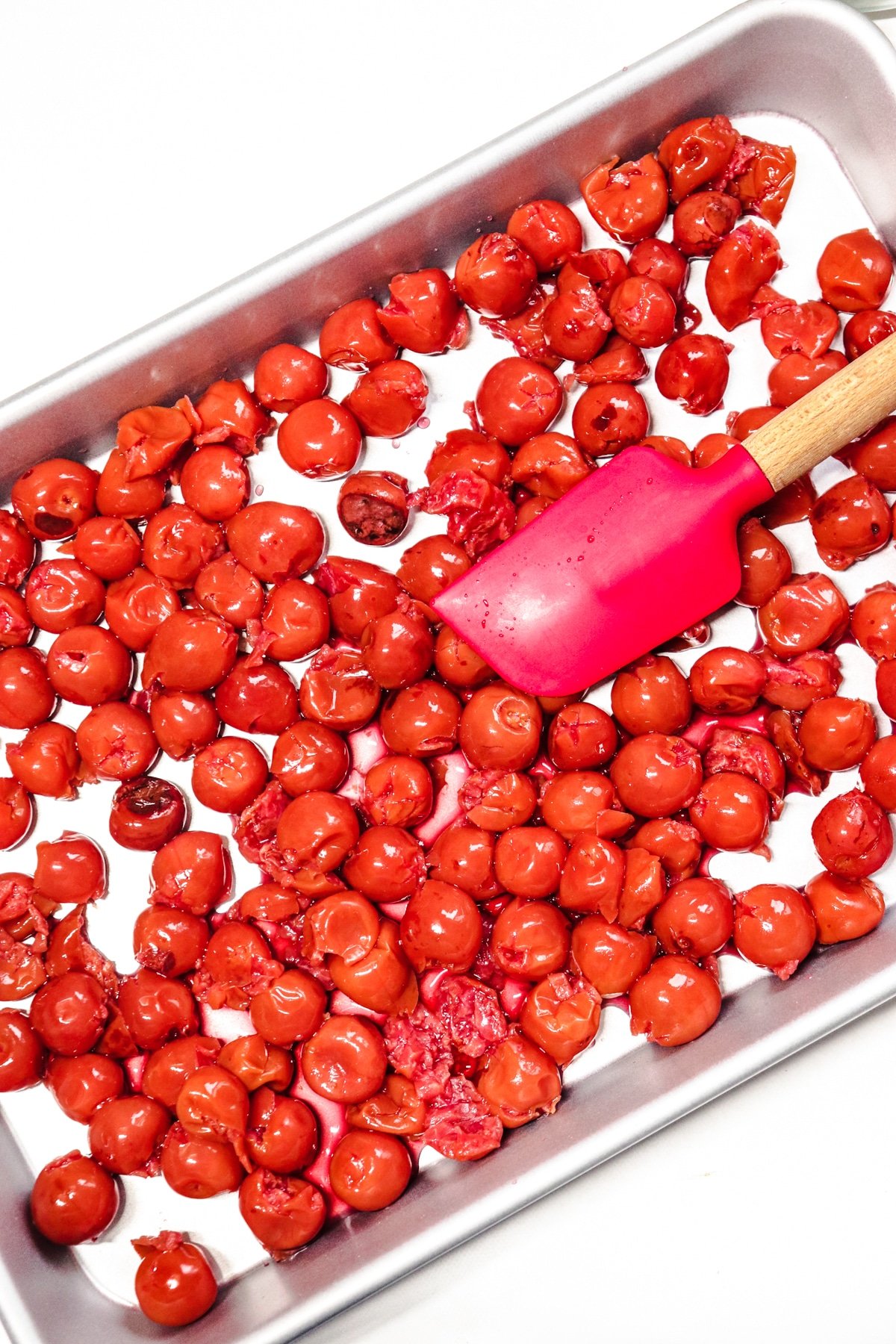 Cherries drained in pan