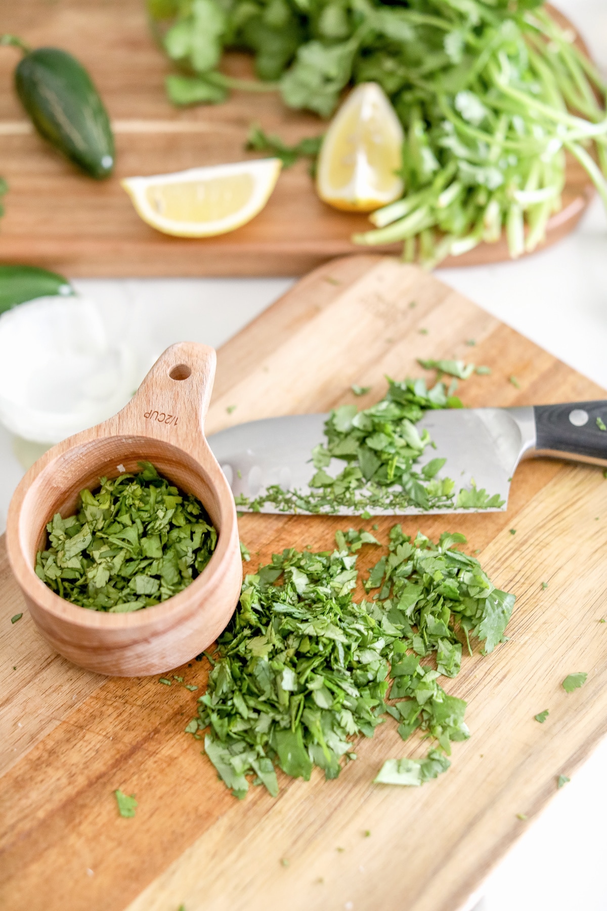 Chop cilantro for tuna patty