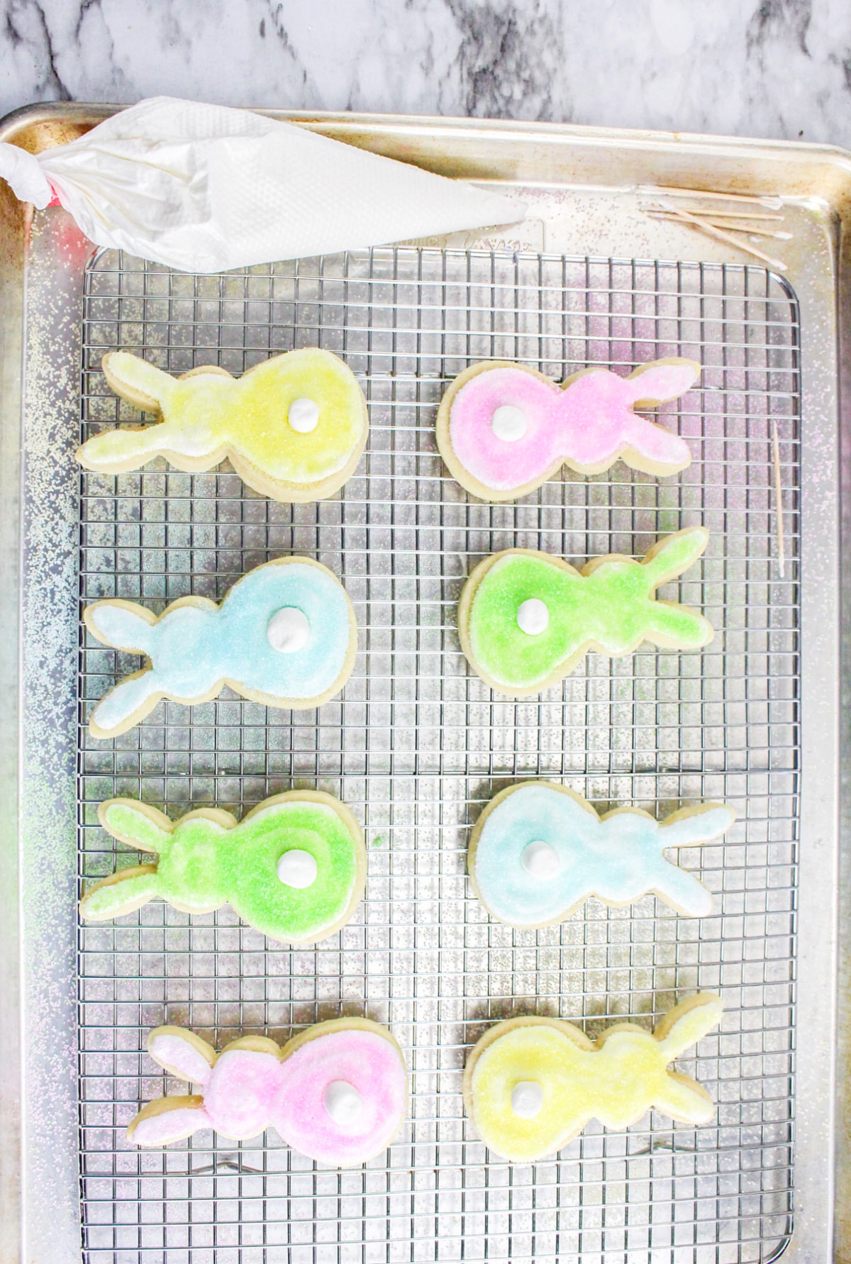 Bunny tail cookies with icing and sprinkles