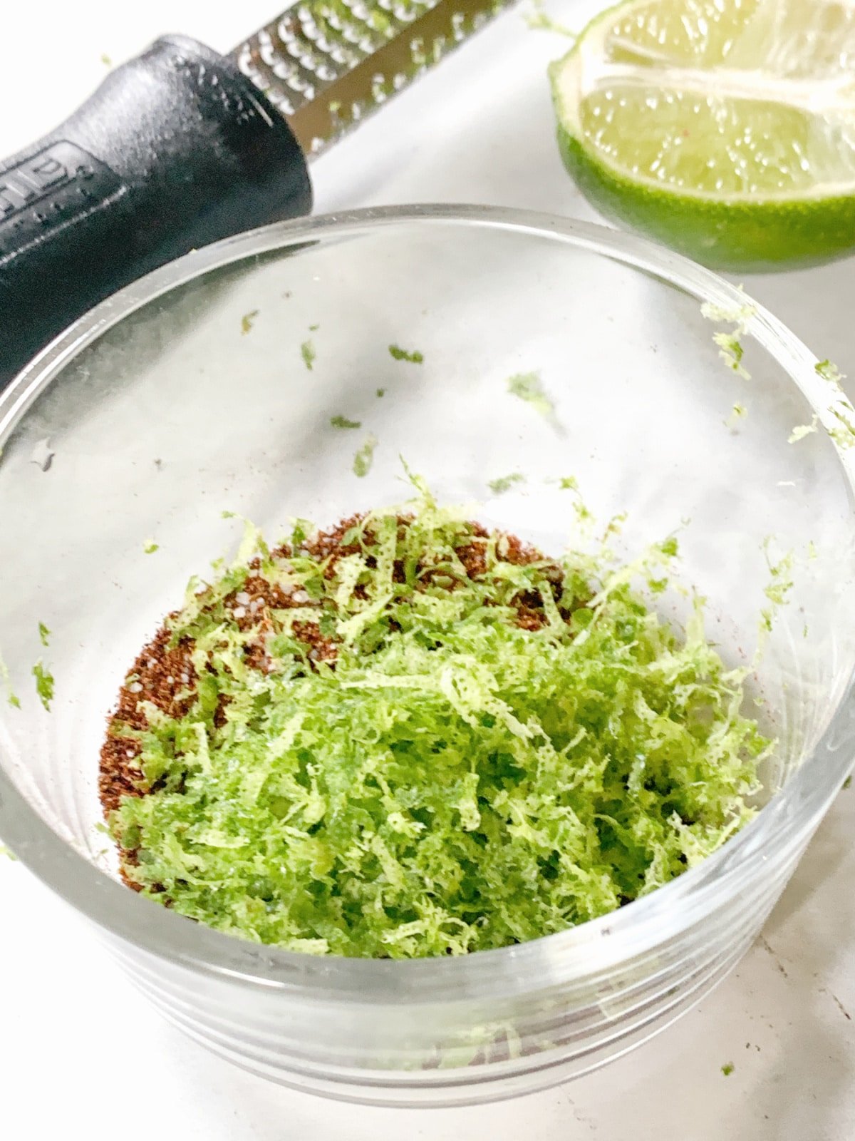 add lime zest to oil and spices