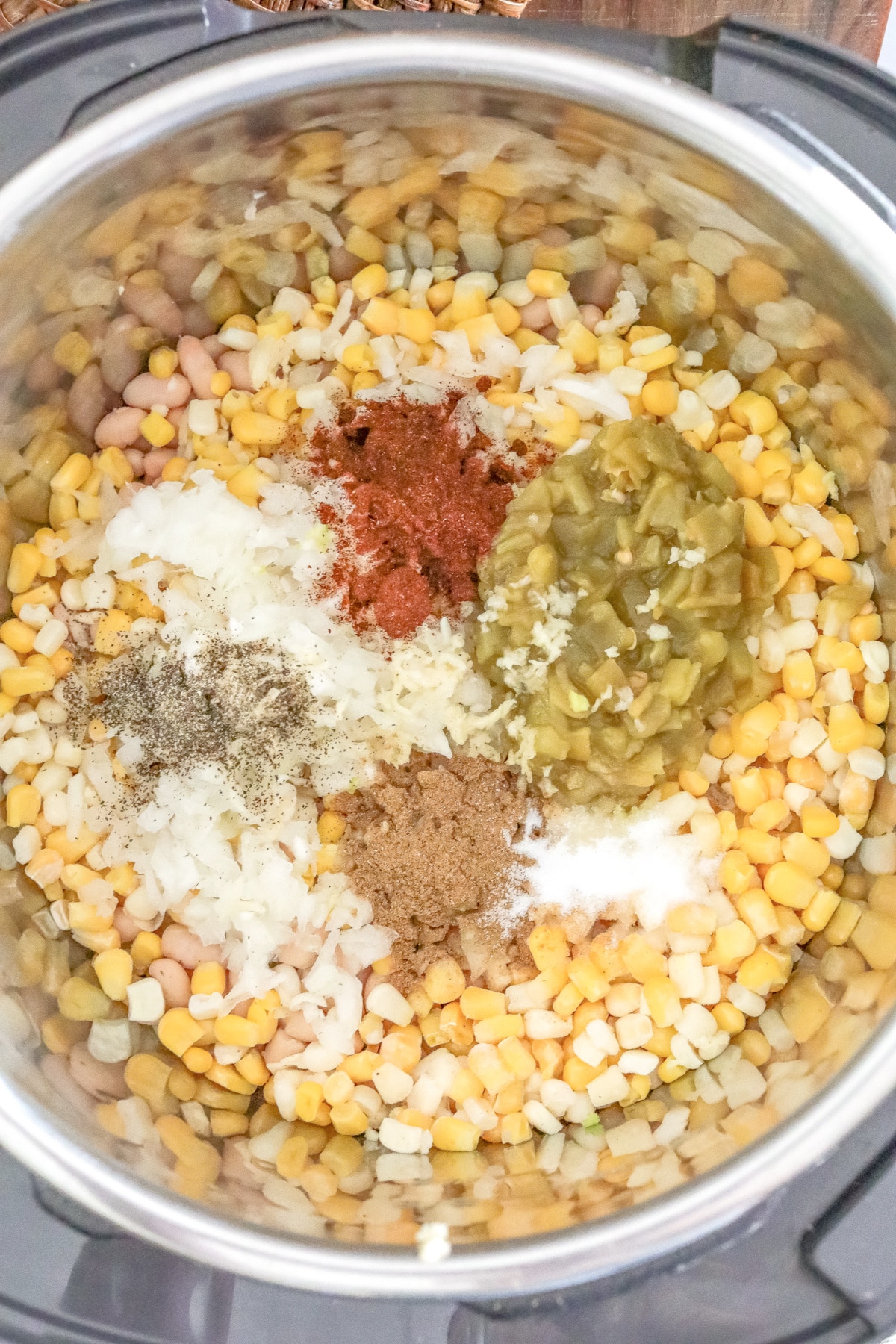 Add beans and veggies with spices to instant pot