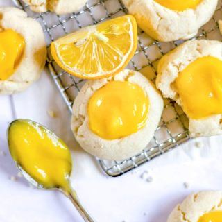Lemon Curd Thumbprint Cookies on a wire rack