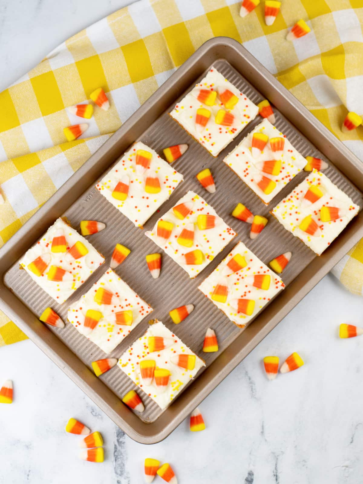 Candy Corn Cookie Bars cut into squares