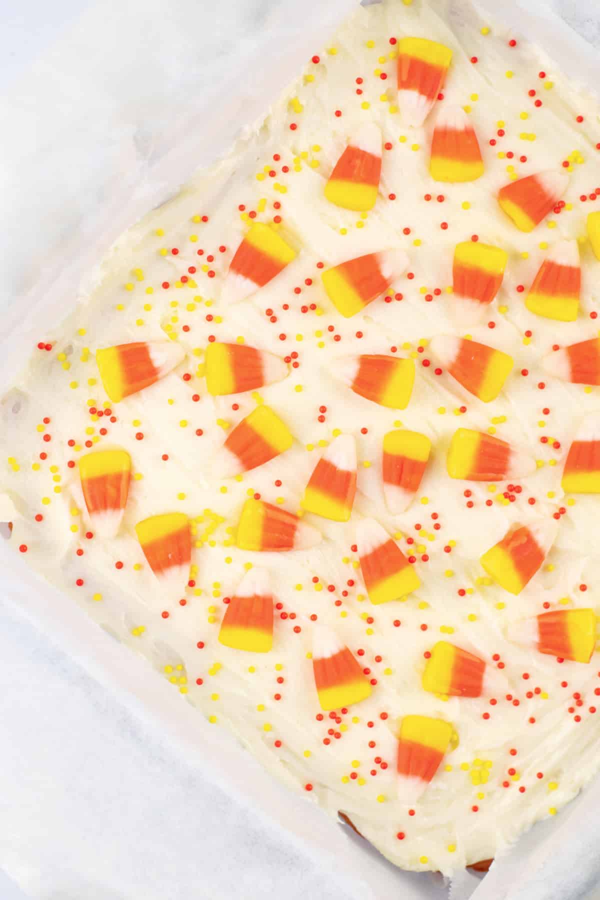 Candy Corn Cookie Bars on parchment