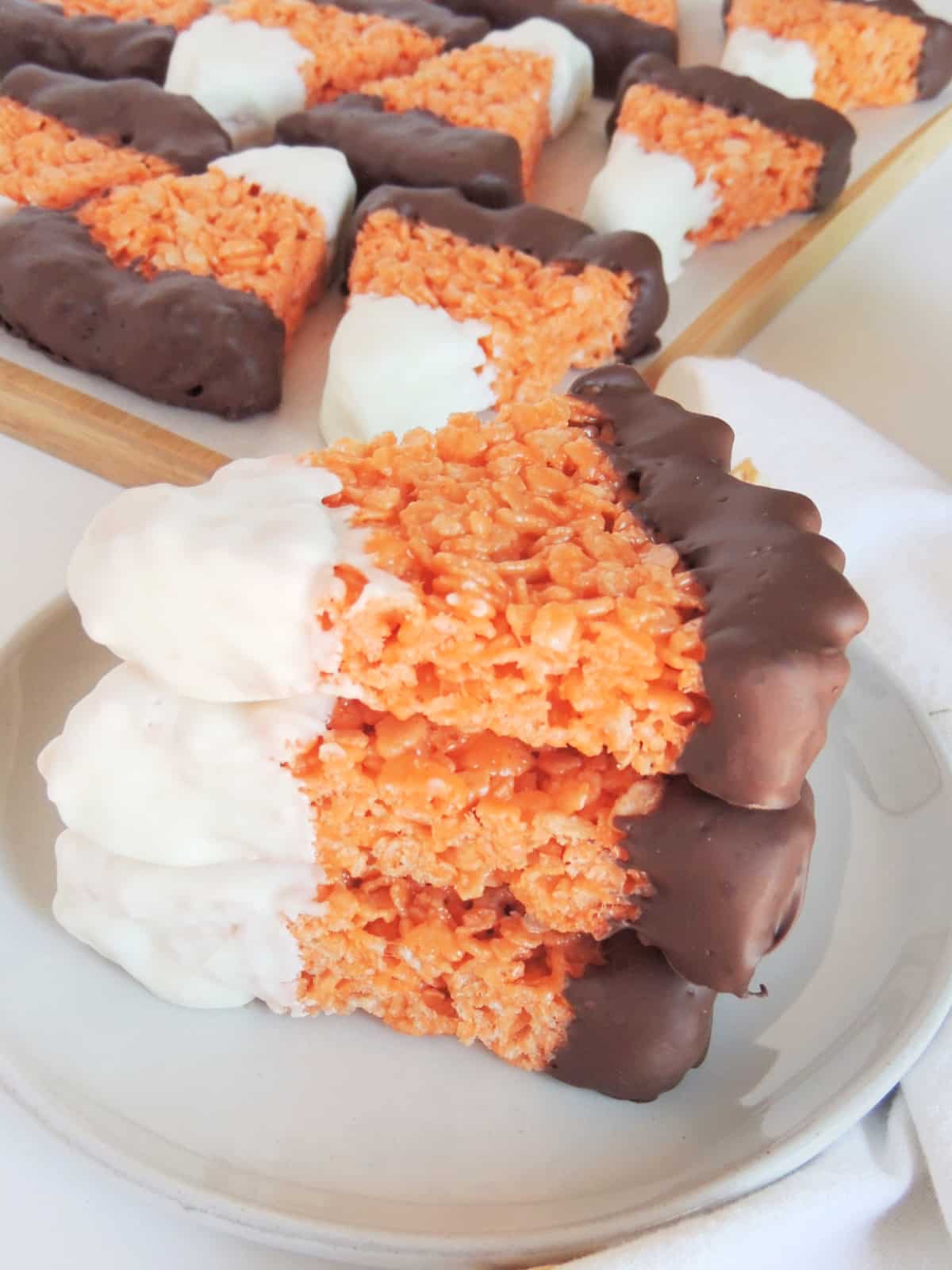 candy corn cereal treats on a plate
