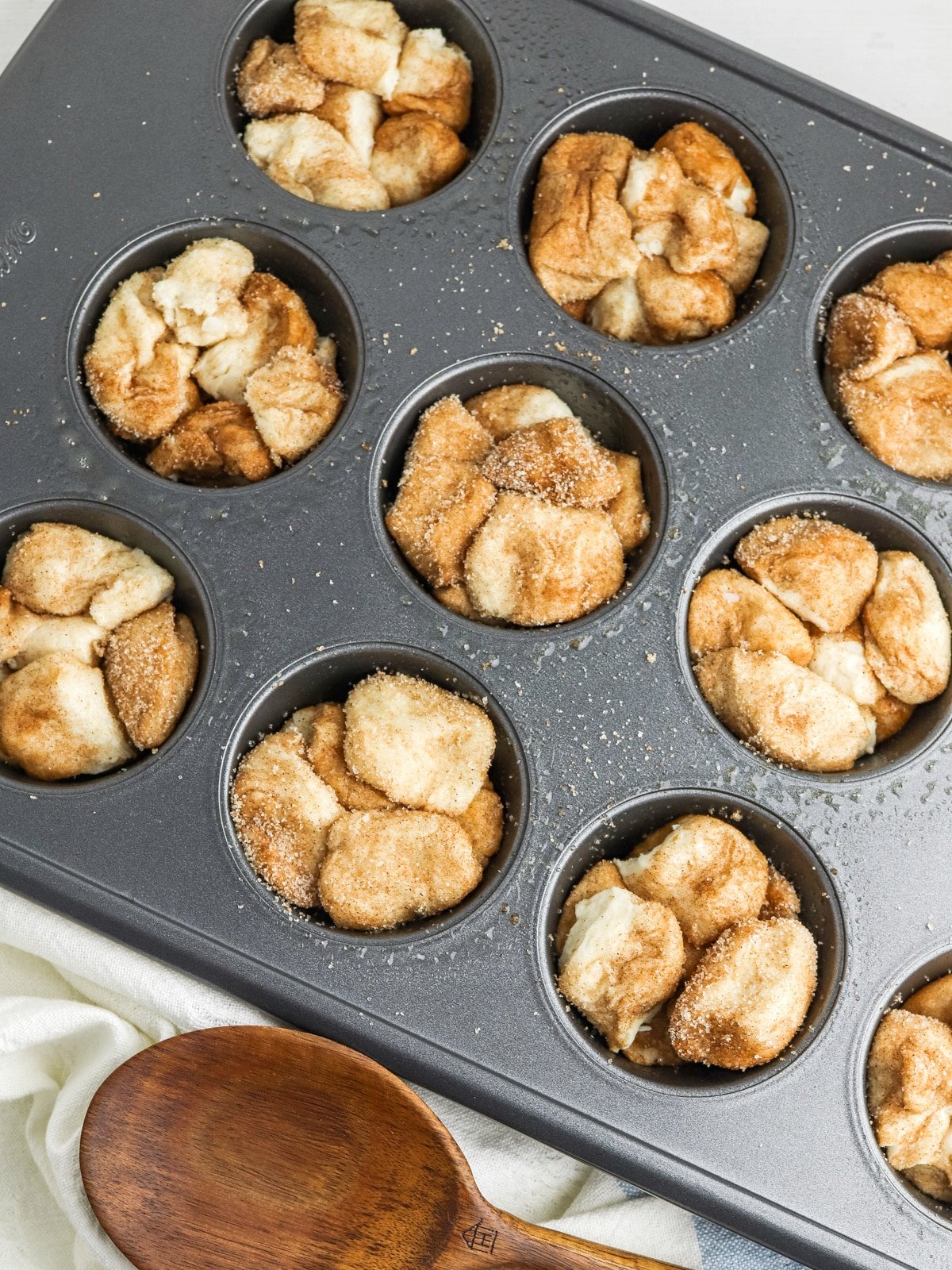 press dough in to greased muffin pan
