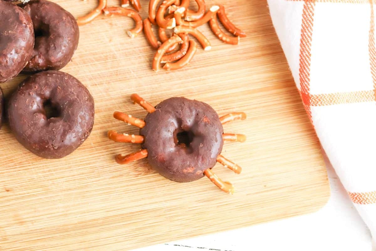 push pretzel legs into donut