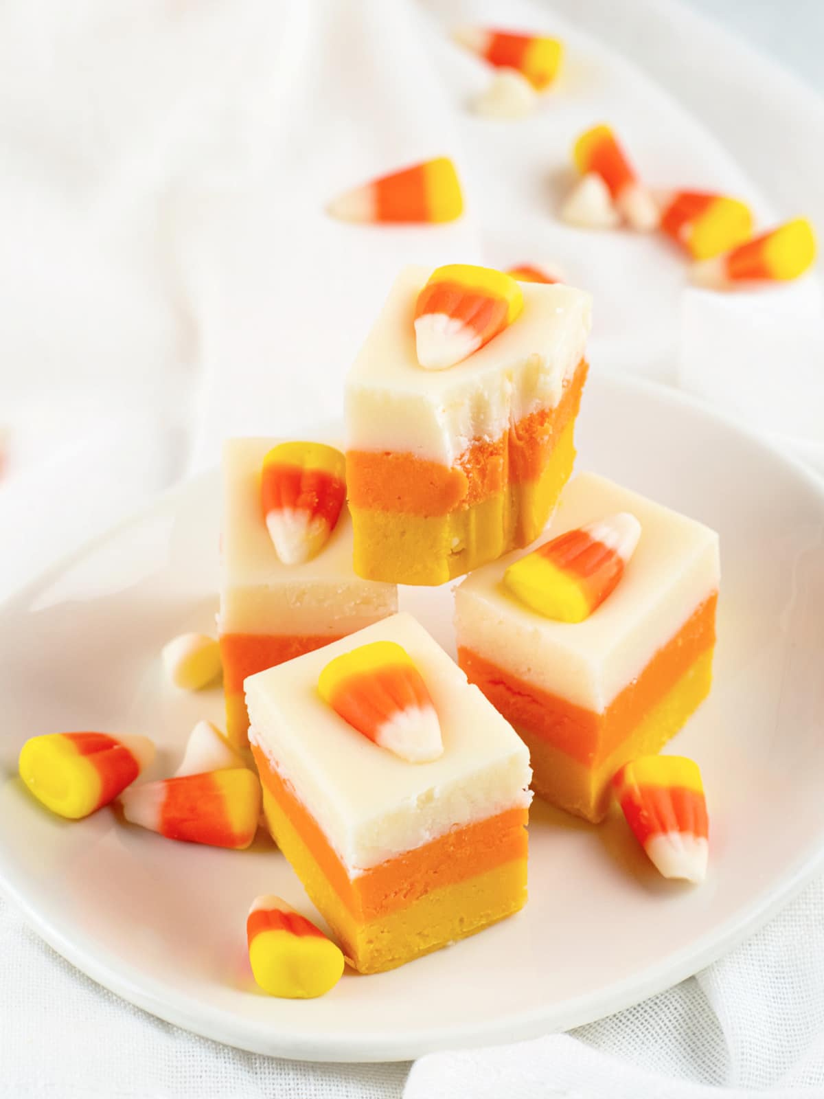 Candy Corn Fudge stacked on a plate