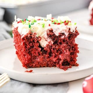 Christmas red velvet Poke Cake on a plate