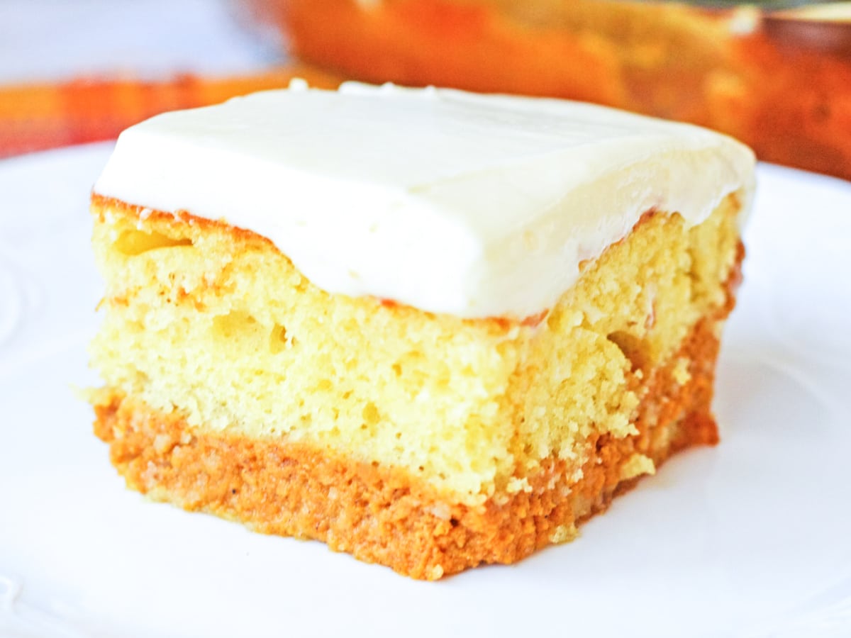 Pumpkin Magic Cake slice on a white plate