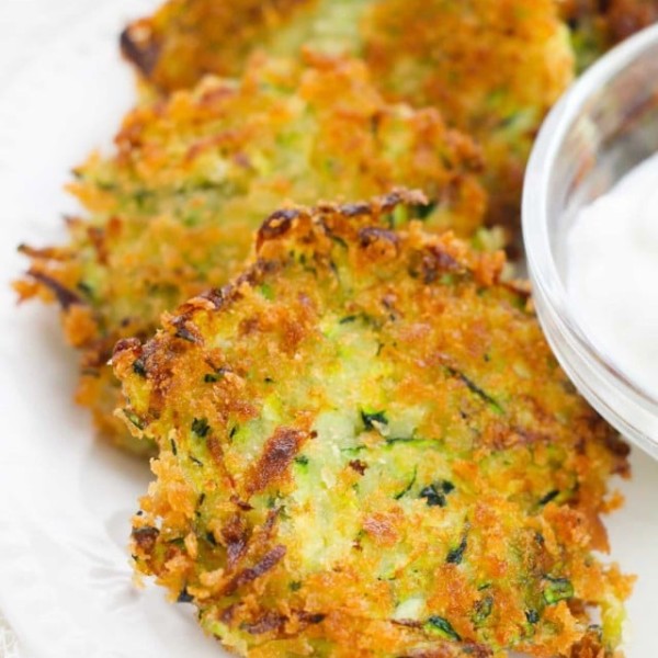 fried zucchini on a white plate