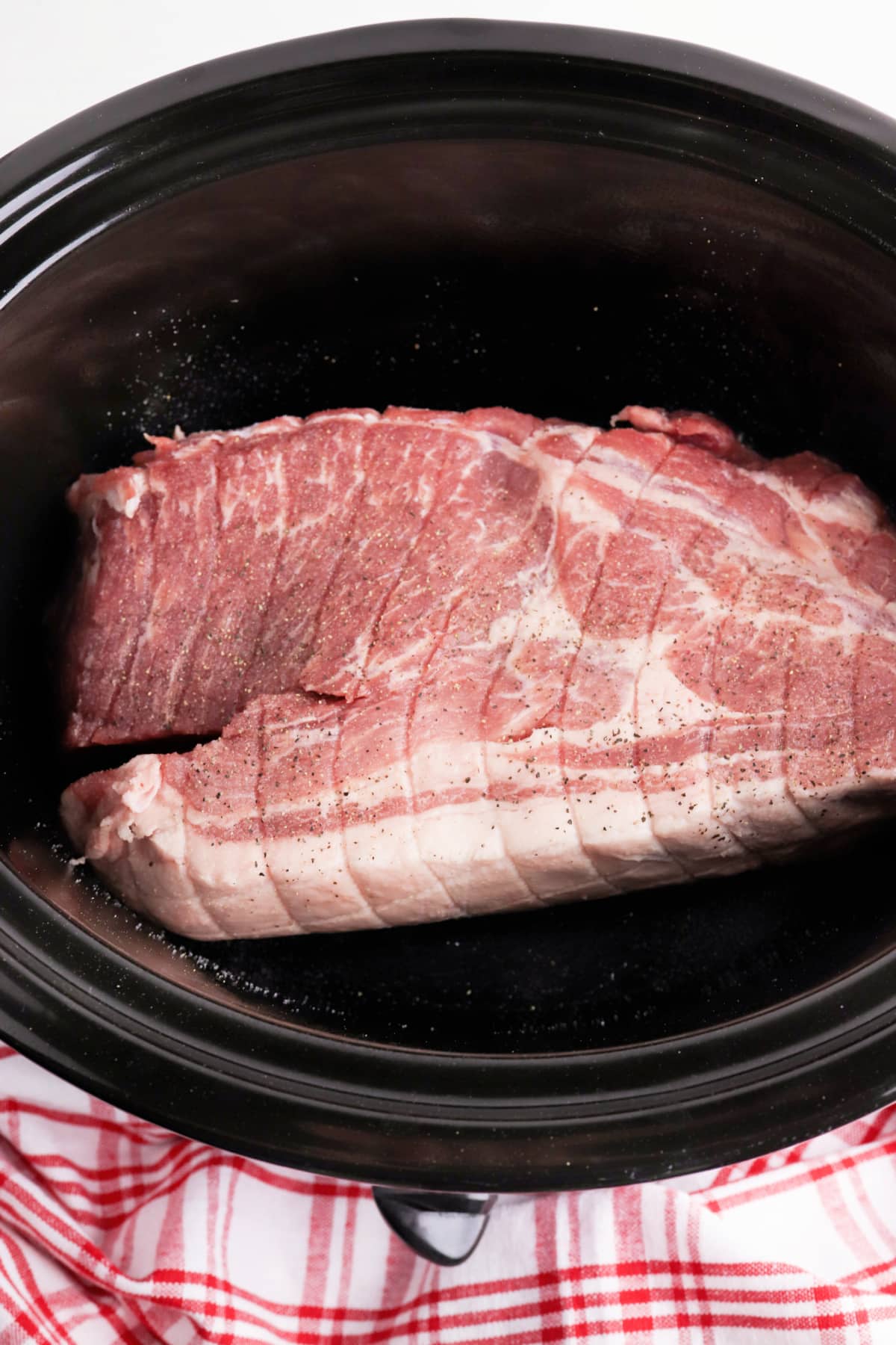 add pork to slow cooker