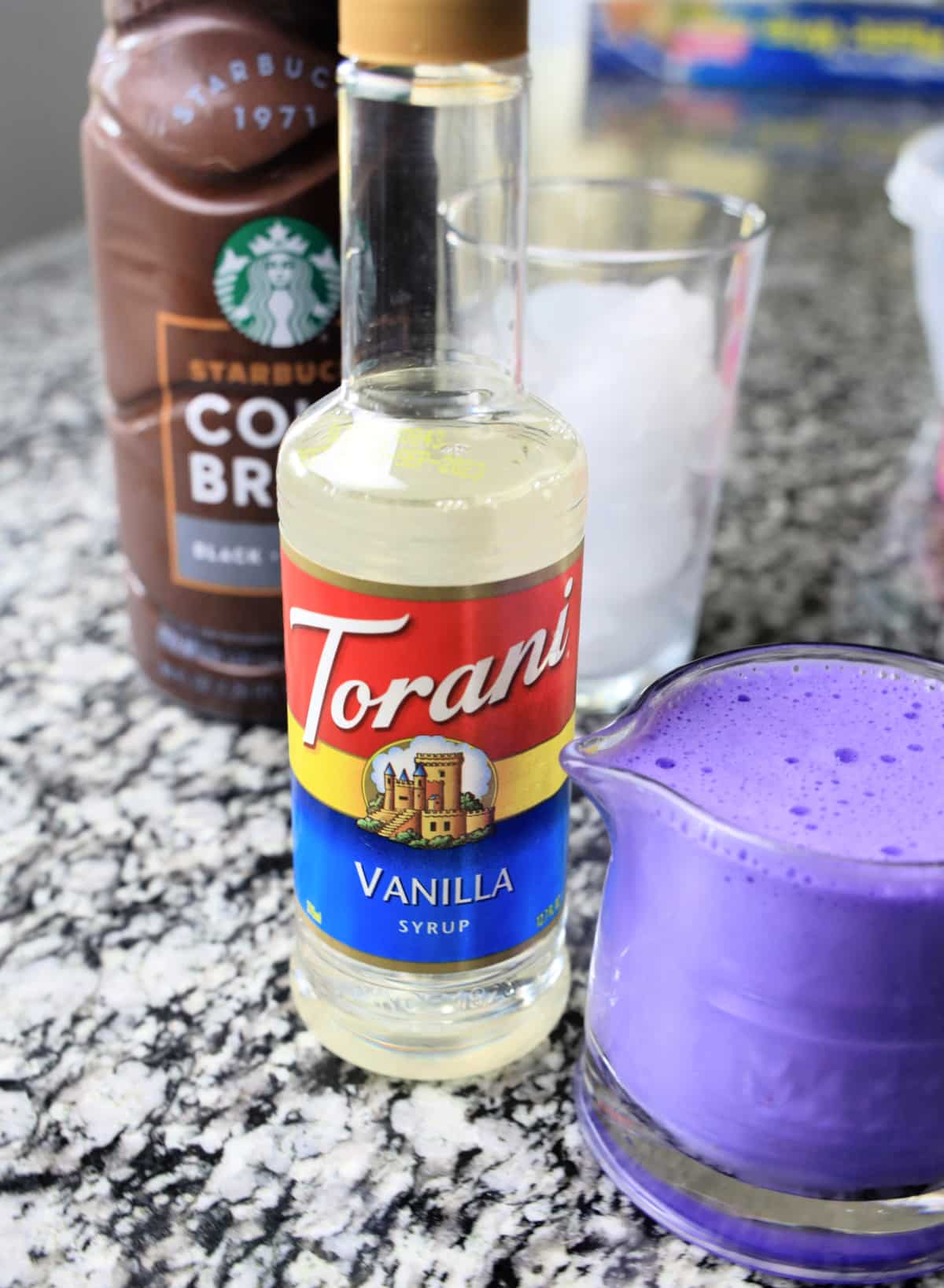 add purple gel coloring and vanilla to cream
