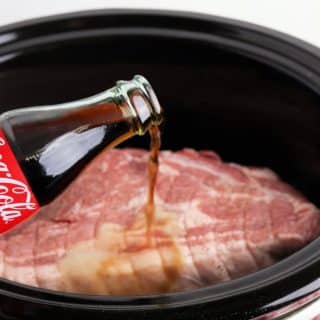 pour coke on pork in slow cooker