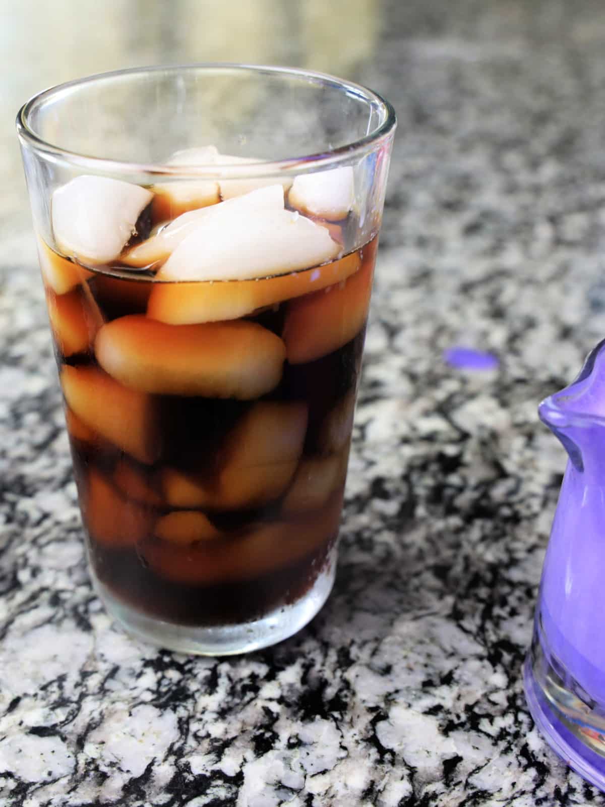 pour cold coffee over ice