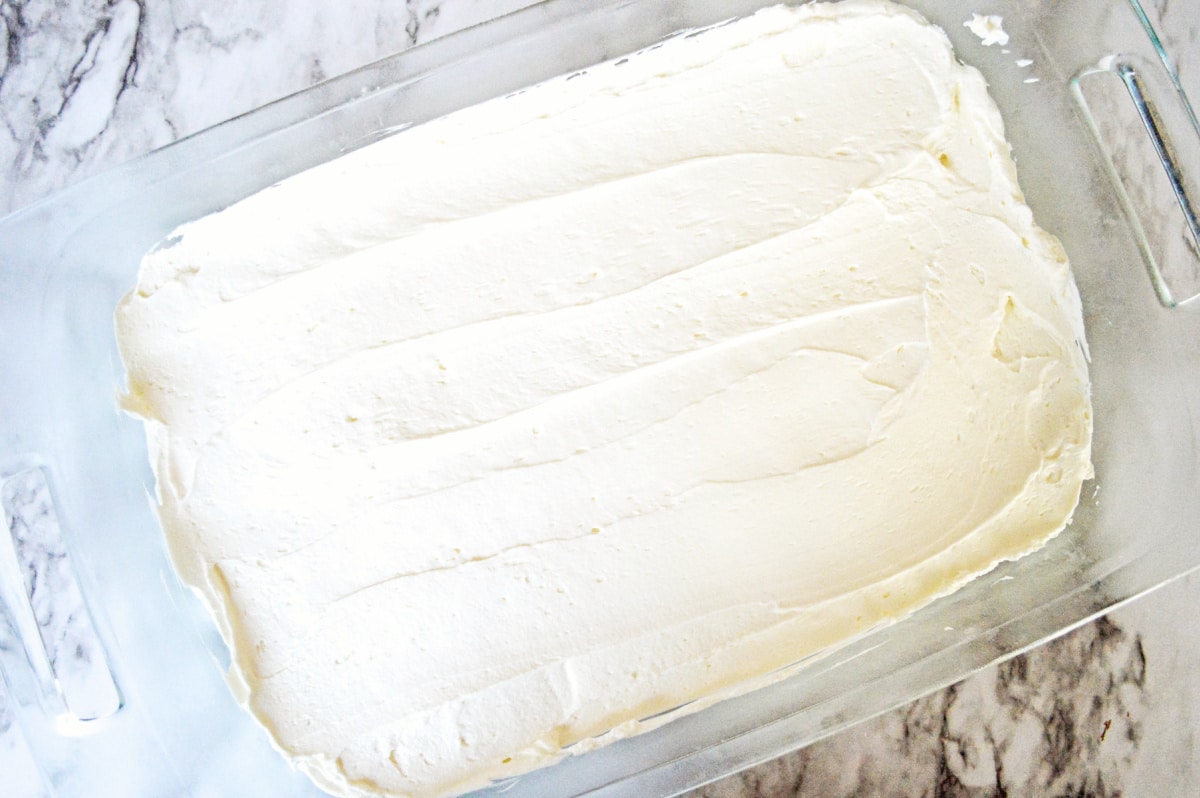 spread cream cheese in pan