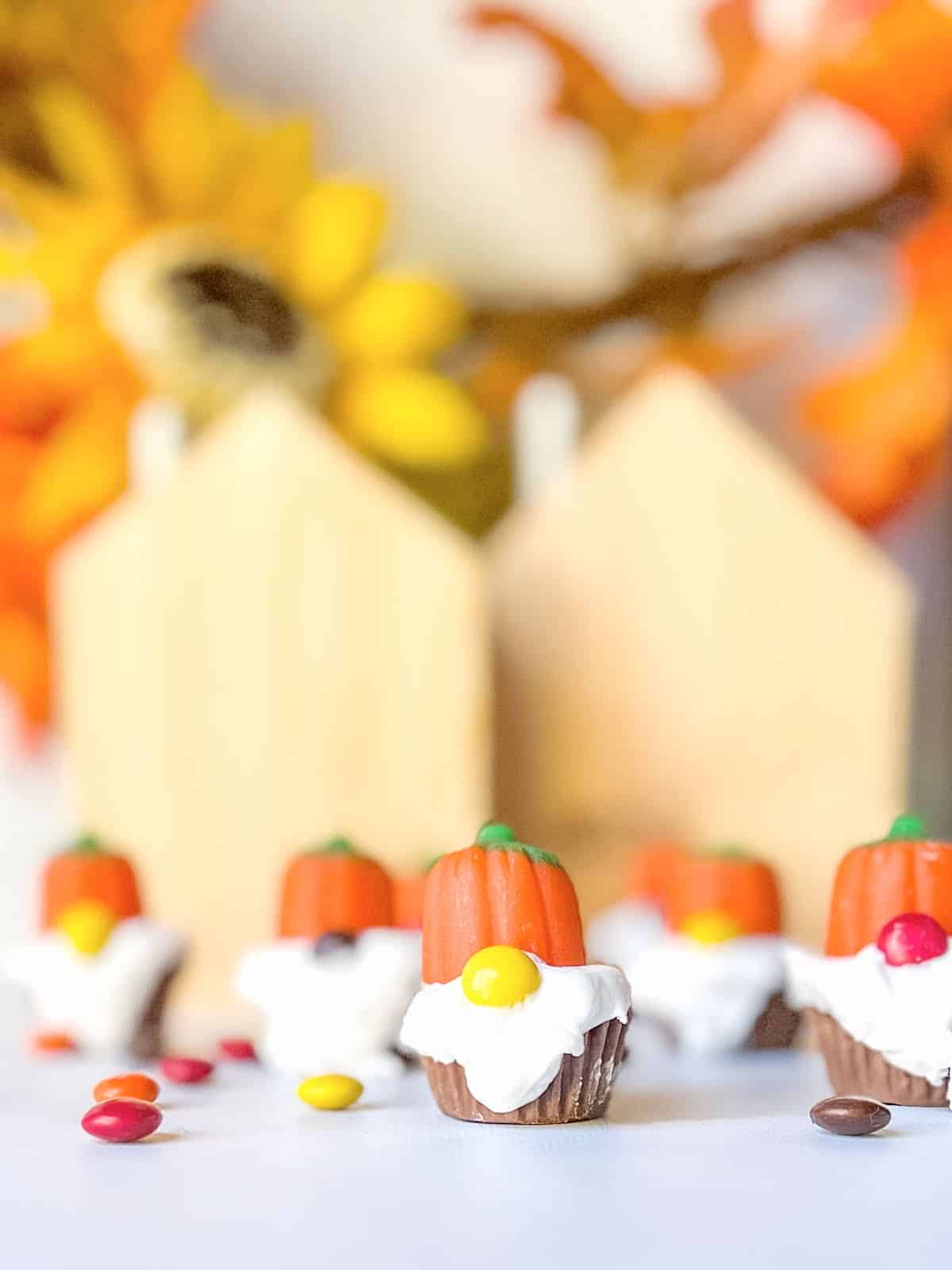 fall gnome candy with pumpkin hats