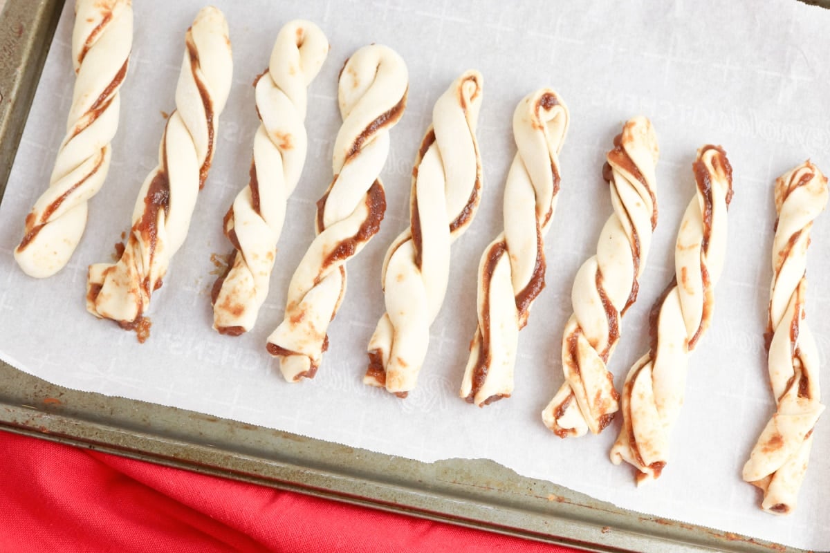 place crescent twists on a parchment lined baking sheet