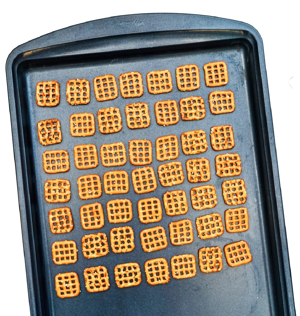 square pretzels on a cookie sheet