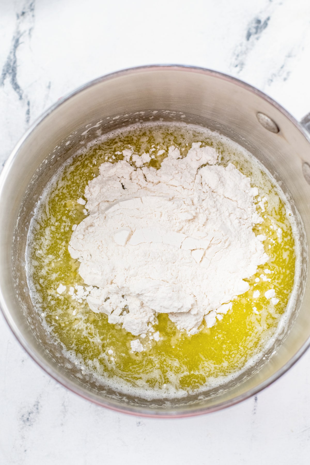 whisk flour into melted butter
