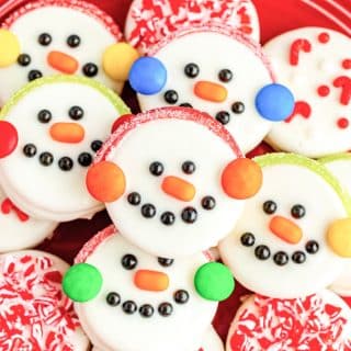 oreo snowmen cookies on a plate