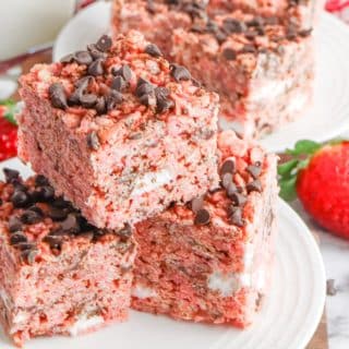 Strawberry Rice Krispie Treats stacked on a plate