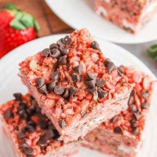 Strawberry Rice Krispie Treats with Chocolate Chips on white plates