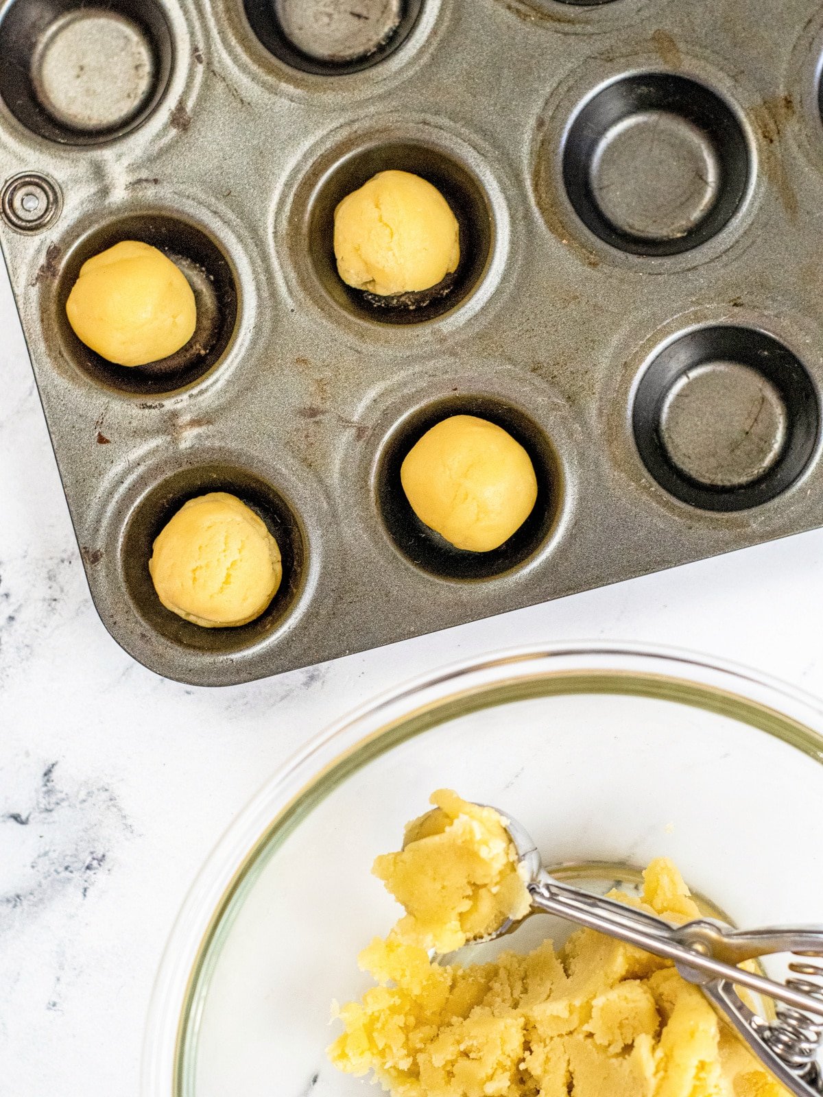 add cookie dough to mini muffin pan