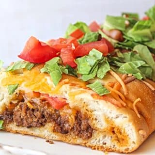taco braid with pizza crust on a serving platter