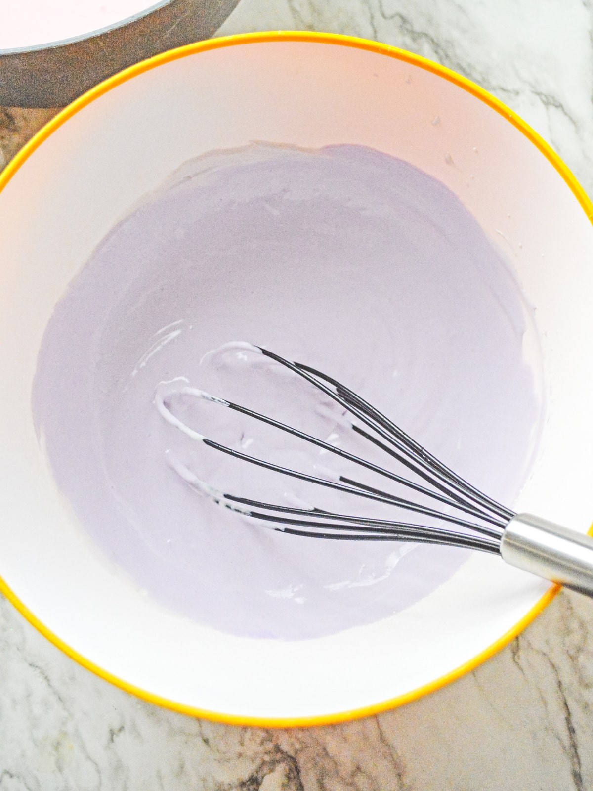 add purple food coloring to a third of the pudding
