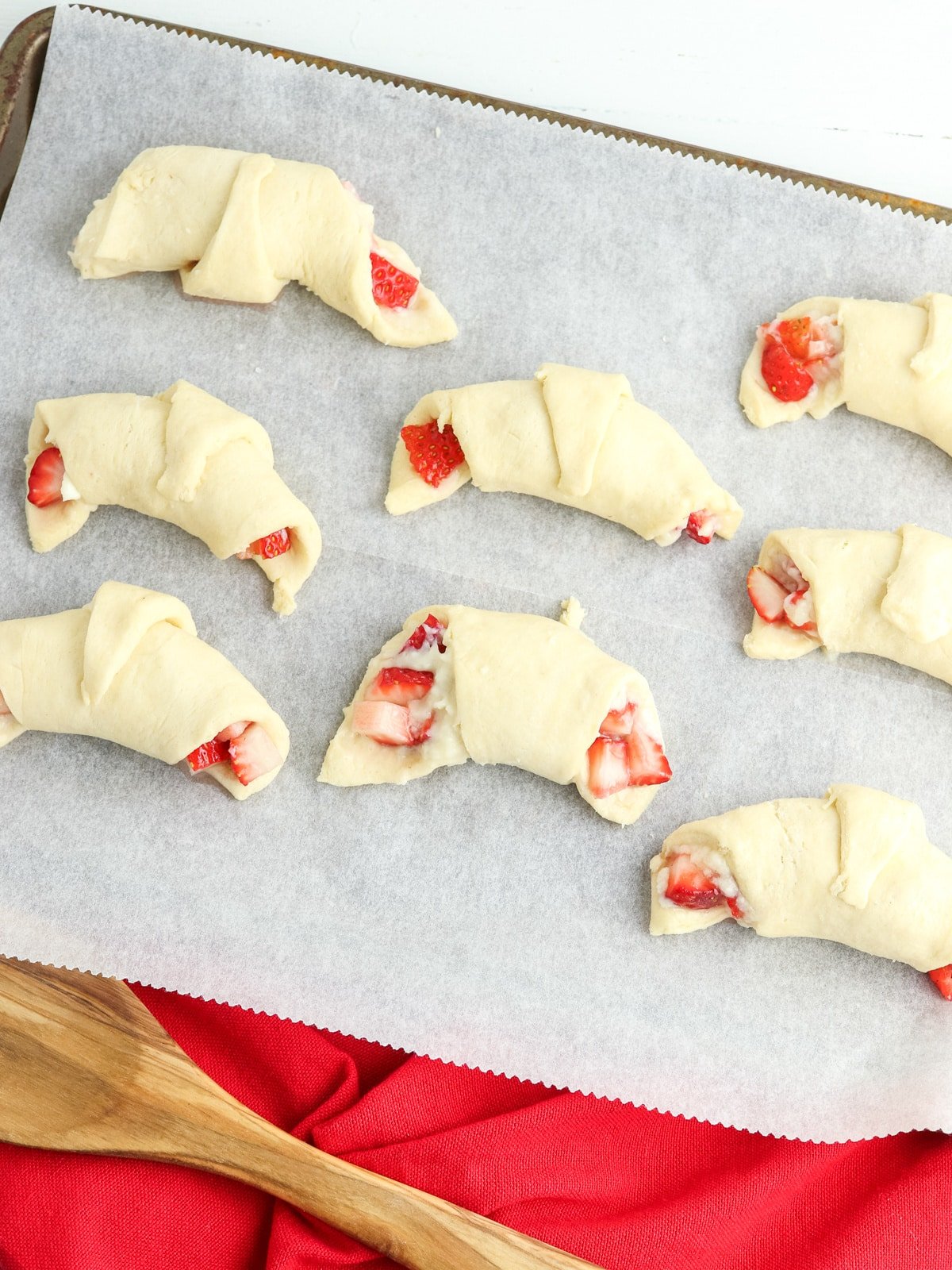 roll crescents and place on parchment paper lined cookie sheet