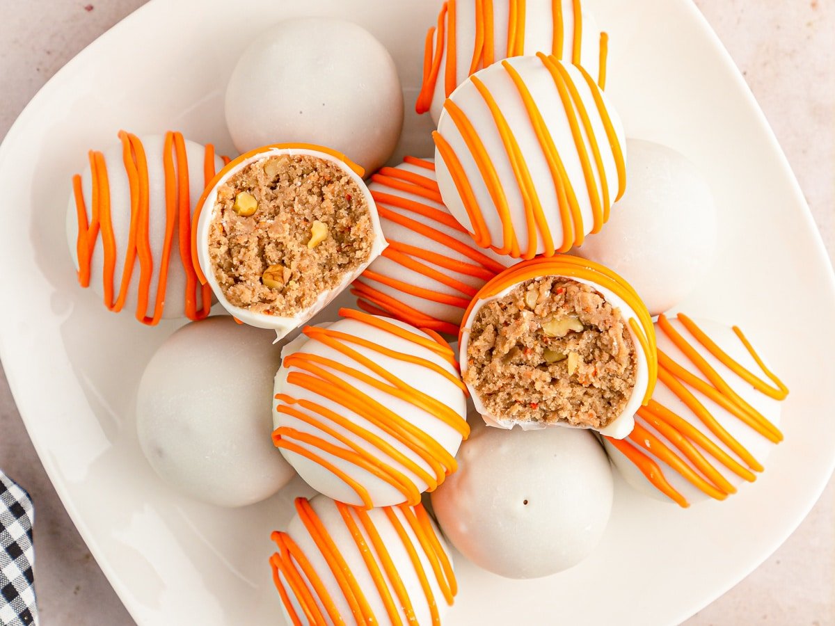 Carrot Cake Balls stacked nicely on a plate.