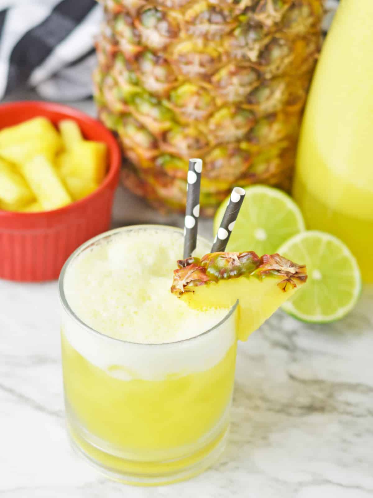 Pineapple agua fresca in glass with ice