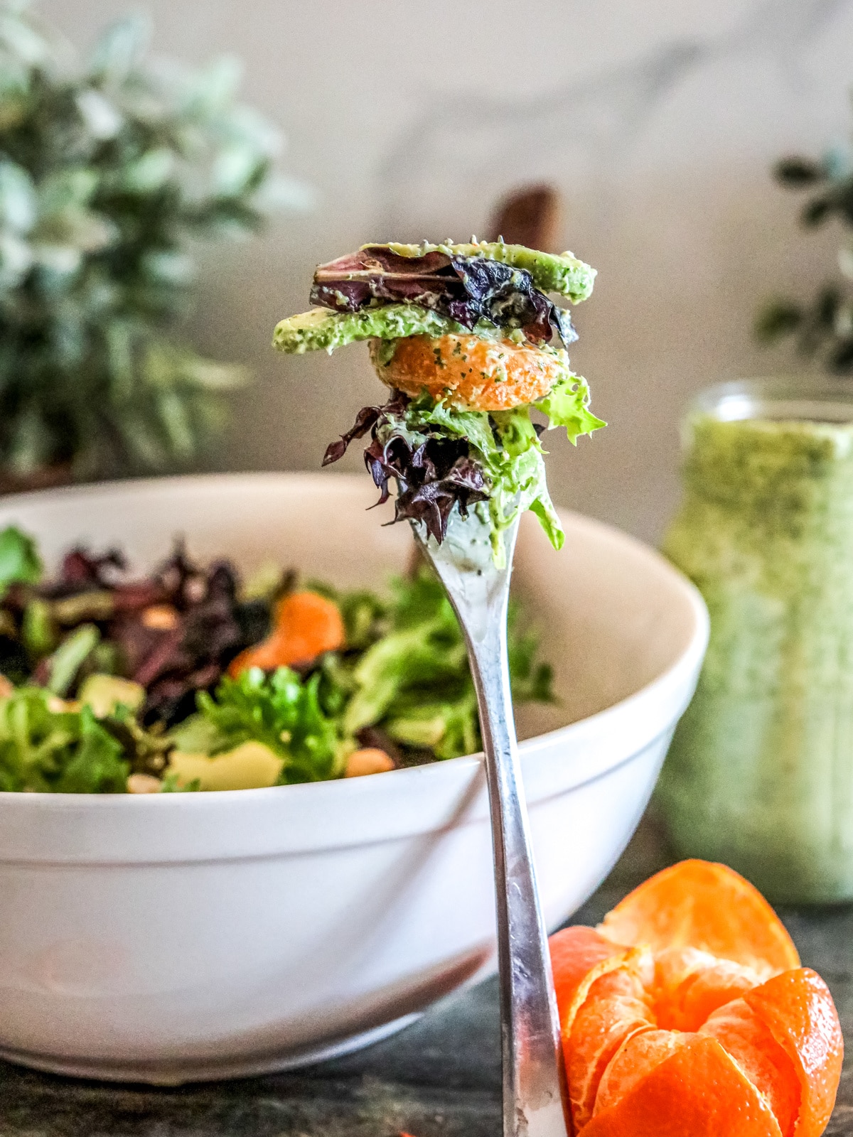 Spring Salad and Dressing bite on a fork